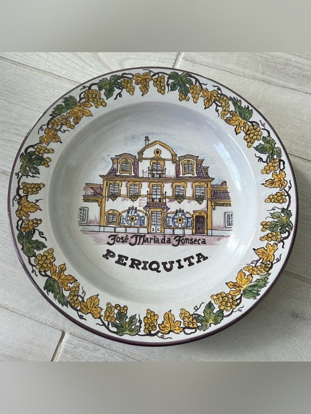 hand-painted Portuguese ceramic bowl features a detailed illustration of Winery